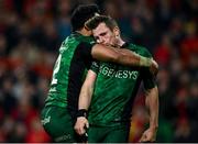16 October 2021; Jack Carty of Connacht is caught by surprise by team-mate Bundee Aki, left, while celebrating their side's second try during the United Rugby Championship match between Munster and Connacht at Thomond Park in Limerick. Photo by Piaras Ó Mídheach/Sportsfile
