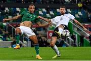 15 November 2021; Josh Magennis of Northern Ireland tussles for the ball with Francesco Acerbi of Italy during the FIFA World Cup 2022 Qualifier match between Northern Ireland and Italy at the National Football Stadium at Windsor Park in Belfast. Photo by Ramsey Cardy/Sportsfile