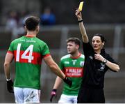 14 November 2021; Referee Maggie Farrelly issues a yellow card to Conor Madden, 14, of Gowna during the Cavan County Senior Club Football Championship Final Replay match between Gowna and Ramor United at Kingspan Breffni in Cavan. Photo by Ben McShane/Sportsfile