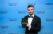 3 December 2021; John Ross Wilson of Shelbourne with his First Division team of the year award during the PFA Ireland Awards at The Marker Hotel in Dublin. Photo by Stephen McCarthy/Sportsfile