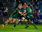 3 December 2021; Josh van der Flier of Leinster is tackled by Finlay Bealham, left, and Dave Heffernan of Connacht during the United Rugby Championship match between Leinster and Connacht at the RDS Arena in Dublin. Photo by Sam Barnes/Sportsfile