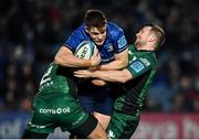 3 December 2021; Garry Ringrose of Leinster is tackled by Dave Heffernan, left, and Jack Carty of Connacht during the United Rugby Championship match between Leinster and Connacht at the RDS Arena in Dublin. Photo by Sam Barnes/Sportsfile
