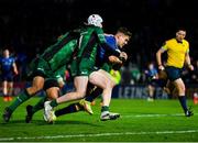 3 December 2021; Garry Ringrose of Leinster on his way to scoring his side's second try despite the attempted tackles from Dave Heffernan, left, and Mack Hansen of Connacht during the United Rugby Championship match between Leinster and Connacht at the RDS Arena in Dublin. Photo by Sam Barnes/Sportsfile