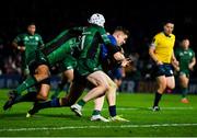 3 December 2021; Garry Ringrose of Leinster goes over to score his side's second try despite the attempted tackles from Dave Heffernan, left, and Mack Hansen of Connacht during the United Rugby Championship match between Leinster and Connacht at the RDS Arena in Dublin. Photo by Sam Barnes/Sportsfile