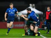 3 December 2021; Robbie Henshaw of Leinster offloads to team-mate Garry Ringrose as he is tackled by Sammy Arnold of Connacht during the United Rugby Championship match between Leinster and Connacht at the RDS Arena in Dublin. Photo by Ramsey Cardy/Sportsfile
