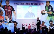 3 December 2021; PFA Ireland First Division Manager of the Year Ian Morris of Shelbourne with MC Darragh Maloney during the PFA Ireland Awards at The Marker Hotel in Dublin. Photo by Stephen McCarthy/Sportsfile