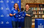 3 December 2021; Elise O'Byrne Whyte is presented with her jersey by Paula Murphy, Head of Strategic Sponsorship and Corporate & Social Responsibility at Bank of Ireland, during the Leinster Rugby Womens Cap and Jersey Presentation at the RDS Library in Dublin. Photo by Sam Barnes/Sportsfile