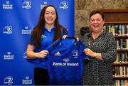 3 December 2021; Clodagh Dunne is presented with her jersey by Paula Murphy, Head of Strategic Sponsorship and Corporate & Social Responsibility at Bank of Ireland, during the Leinster Rugby Womens Cap and Jersey Presentation at the RDS Library in Dublin. Photo by Sam Barnes/Sportsfile