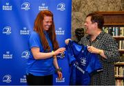 3 December 2021; Caoimhe Molloy is presented with her jersey by Paula Murphy, Head of Strategic Sponsorship and Corporate & Social Responsibility at Bank of Ireland, during the Leinster Rugby Womens Cap and Jersey Presentation at the RDS Library in Dublin. Photo by Sam Barnes/Sportsfile