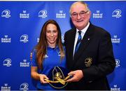 3 December 2021; Emily McKeown is presented with her cap by Leinster Rugby President John Walsh during the Leinster Rugby Womens Cap and Jersey Presentation at the RDS Library in Dublin. Photo by Sam Barnes/Sportsfile