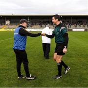 28 November 2021; Ballyea manager Robbie Hogan with referee John O'Halloran before the AIB Munster Club Senior Hurling Championship Quarter-Final match between Ballyea and Ballygunner at Cusack Park in Ennis, Clare. Photo by Ray McManus/Sportsfile