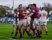 4 December 2021; Cormac Daly of Clontarf celebrates with team-mates after scoring his side's fourth try during the Energia Men’s All-Ireland League Division 1A match between Clontarf and Dublin University at Castle Avenue in Dublin. Photo by David Fitzgerald/Sportsfile