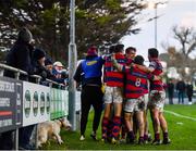 4 December 2021; Cormac Daly of Clontarf, centre, celebrates with team-mates after scoring his side's fourth try during the Energia Men’s All-Ireland League Division 1A match between Clontarf and Dublin University at Castle Avenue in Dublin. Photo by David Fitzgerald/Sportsfile