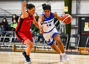 4 December 2021; Rachel Thompson of WIT Waterford Wildcats in action against Tricia Byrne of Fr Mathews during the InsureMyHouse.ie Paudie O’Connor Cup Quarter-Final match between Fr. Mathews and WIT Waterford Wildcats at Fr. Mathews Arena in Cork. Photo by Sam Barnes/Sportsfile