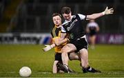 4 December 2021; Ryan McEvoy of Kilcoo is tackled by Gareth Mannion of Ramor United during the AIB Ulster GAA Football Senior Club Championship Quarter-Final match between Ramor United and Kilcoo at Kingspan Breffni in Cavan. Photo by Seb Daly/Sportsfile