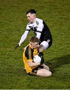 4 December 2021; James Brady of Ramor United in action against Miceal Rooney of Kilcoo during the AIB Ulster GAA Football Senior Club Championship Quarter-Final match between Ramor United and Kilcoo at Kingspan Breffni in Cavan. Photo by Seb Daly/Sportsfile