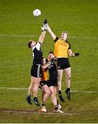 4 December 2021; Aaron Morgan of Kilcoo in action against Enda Maguire of Ramor United at the throw-in of the AIB Ulster GAA Football Senior Club Championship Quarter-Final match between Ramor United and Kilcoo at Kingspan Breffni in Cavan. Photo by Seb Daly/Sportsfile