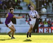 5 December 2021; Dan O'Brien of Kilmacud Crokes in action against Alan Callaghan of Wolfe Tones during the AIB Leinster GAA Football Senior Club Championship Quarter-Final match between Wolfe Tones and Kilmacud Crokes at Páirc Tailteann in Navan, Meath. Photo by Ray McManus/Sportsfile
