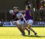 5 December 2021; Paul Mannion of Kilmacud Crokes is tackled by Adam O’Neill, left, and Thomas O’Reilly of Wolfe Tones during the AIB Leinster GAA Football Senior Club Championship Quarter-Final match between Wolfe Tones and Kilmacud Crokes at Páirc Tailteann in Navan, Meath. Photo by Ray McManus/Sportsfile