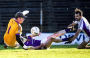 5 December 2021; Ben Shovlin of Kilmacud Crokes shoots past Stephen Sheppard and Wolfe Tones goalkeeper Cian Farnan on his way to scoring his side's first goal during the AIB Leinster GAA Football Senior Club Championship Quarter-Final match between Wolfe Tones and Kilmacud Crokes at Páirc Tailteann in Navan, Meath. Photo by Ray McManus/Sportsfile