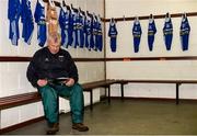 5 December 2021; Scotstown's kit man Micheal McKenna having a look at the program before the AIB Ulster GAA Football Club Senior Championship Quarter-Final match between Glen and Scotstown at Celtic Park in Derry. Photo by Philip Fitzpatrick/Sportsfile