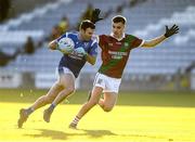 5 December 2021; Paddy Dowdall of St Loman's in action against Ronan Coffey of Portarlington during the AIB Leinster GAA Football Senior Club Championship Quarter-Final match between Portarlington and St Loman's at MW Hire O’Moore Park in Portlaoise, Laois. Photo by Matt Browne/Sportsfile