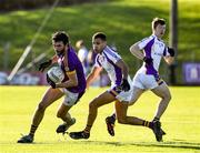 5 December 2021; Alan Callaghan of Wolfe Tones in action against Craig Dias of Kilmacud Crokes during the AIB Leinster GAA Football Senior Club Championship Quarter-Final match between Wolfe Tones and Kilmacud Crokes at Páirc Tailteann in Navan, Meath. Photo by Ray McManus/Sportsfile