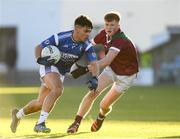 5 December 2021; TJ Cox of St Loman's in action against Rioghan Murphy of Portarlington during the AIB Leinster GAA Football Senior Club Championship Quarter-Final match between Portarlington and St Loman's at MW Hire O’Moore Park in Portlaoise, Laois. Photo by Matt Browne/Sportsfile