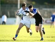 5 December 2021; Tom Browne of Naas in action against Jack Gilligan of Blessington during the AIB Leinster GAA Football Senior Club Championship Quarter-Final match between Naas and Blessington at St Conleth's Park in Newbridge, Kildare. Photo by David Fitzgerald/Sportsfile