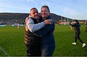 5 December 2021; Clann Eireann manager Tommy Coleman, left, and selector James Byrne celebrate at the final whistle of the AIB Ulster GAA Football Club Senior Championship Quarter-Final match between Kickhams Creggan and Clann Eireann at Corrigan Park in Belfast. Photo by Ramsey Cardy/Sportsfile