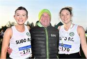 5 December 2021; Eimear O'Connor, left, and Eavan Mcloughlin of Sligo AC, with coach Ray Flynn after the Novice Women's 4000m event during the Irish Life Health National Novice, Junior, and Juvenile Uneven Age Cross Country Championships at Gowran Park in Kilkenny. Photo by Sam Barnes/Sportsfile