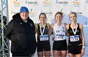 5 December 2021; Athletics Ireland President John Cronin, with Novice Women's 4000m medallists, Eavan Mcloughlin of Sligo AC, Sligo, second from right, gold, Christine Russell of Letterkenny AC, Donegal, second from left, silver, and Noeleen Scanlan of Letterkenny AC, Donegal, right, bronze, during the Irish Life Health National Novice, Junior, and Juvenile Uneven Age Cross Country Championships at Gowran Park in Kilkenny. Photo by Sam Barnes/Sportsfile