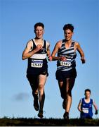 5 December 2021; David Williams of St Senans AC, Kilkenny, left, and Frank Mcgrath of Lagan Valley AC, Antrim, competing in the Boys U17 event during the Irish Life Health National Novice, Junior, and Juvenile Uneven Age Cross Country Championships at Gowran Park in Kilkenny. Photo by Sam Barnes/Sportsfile