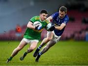5 December 2021; Conleth McGuckian of Glen in action against Paul Sherlock of Scotstown during the AIB Ulster GAA Football Club Senior Championship Quarter-Final match between Glen and Scotstown at Celtic Park in Derry. Photo by Philip Fitzpatrick/Sportsfile