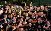 5 December 2021; Austin Stacks players and supporters celebrate with the Bishop Moynihan Cup after the Kerry County Senior Football Championship Final match between Austin Stacks and Kerins O'Rahilly's at Austin Stack Park in Tralee, Kerry. Photo by Brendan Moran/Sportsfile