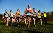 5 December 2021; Isabella Burke of Galway City Harriers AC, Galway, leads a group of runners whilst competing in the Girls U17 event during the Irish Life Health National Novice, Junior, and Juvenile Uneven Age Cross Country Championships at Gowran Park in Kilkenny. Photo by Sam Barnes/Sportsfile