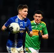 5 December 2021; Matthew Maguire of Scotstown in action against Tiarnan Flannagan of Glen during the AIB Ulster GAA Football Club Senior Championship Quarter-Final match between Glen and Scotstown at Celtic Park in Derry. Photo by Philip Fitzpatrick/Sportsfile