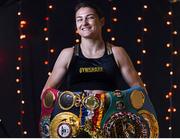 8 December 2021; Katie Taylor poses for a portrait with her belts during a media day ahead of her Undisputed Lightweight Championship bout against Firuza Sharipova at the Liverpool Guild of Students in Liverpool, England. Photo by Mark Robinson / Matchroom Boxing via Sportsfile
