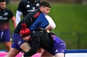10 December 2021; Ethan Coughlan, bottom and Tony Butler during Munster Rugby squad training at University of Limerick in Limerick. Photo by Brendan Moran/Sportsfile