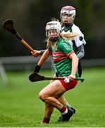 11 December 2021; Niamh Treacy of Drom and Inch in action against Klara Donohue of Sarsfields during the 2020 AIB All-Ireland Senior Club Camogie Championship Semi-Final match between Sarsfields and Drom and Inch at Edenderry GAA club in Edenderry, Offaly. Photo by Piaras Ó Mídheach/Sportsfile