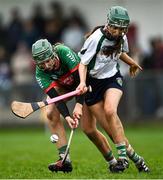 11 December 2021; Miriam Campion of Drom and Inch in action against Tara Kenny of Sarsfields during the 2020 AIB All-Ireland Senior Club Camogie Championship Semi-Final match between Sarsfields and Drom and Inch at Edenderry GAA club in Edenderry, Offaly. Photo by Piaras Ó Mídheach/Sportsfile
