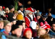 11 December 2021; A supporter dressed as Father Christmas watches from the stands during the AIB Connacht GAA Football Senior Club Championship Semi-Final match between Pádraig Pearses and Mountbellew/Moylough at Dr Hyde Park in Roscommon. Photo by Eóin Noonan/Sportsfile