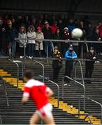 11 December 2021; Supporters watch from the terrace during the AIB Connacht GAA Football Senior Club Championship Semi-Final match between Pádraig Pearses and Mountbellew/Moylough at Dr Hyde Park in Roscommon. Photo by Eóin Noonan/Sportsfile