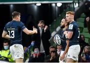 11 December 2021; Jamison Gibson-Park of Leinster celebrates after scoring his side's first try with Ciarán Frawley and Garry Ringrose during the Heineken Champions Cup Pool A match between Leinster and Bath at Aviva Stadium in Dublin. Photo by Harry Murphy/Sportsfile