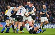 11 December 2021; Tadhg Furlong of Leinster is tackled by Bath players, Josh Bayliss, Will Stuart and Jacques Du Toit during the Heineken Champions Cup Pool A match between Leinster and Bath at Aviva Stadium in Dublin. Photo by Brendan Moran/Sportsfile