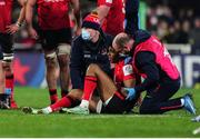 11 December 2021; Robert Baloucoune of Ulster receives medical attention during the Heineken Champions Cup Pool A match between ASM Clermont Auvergne and Ulster at Stade Marcel-Michelin in Clermont-Ferrand, France. Photo by Julien Poupart/Sportsfile