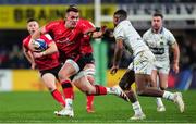 11 December 2021; James Hume of Ulster evades the tackle of Cheikh Tiberghien of Clermont Auvergne during the Heineken Champions Cup Pool A match between ASM Clermont Auvergne and Ulster at Stade Marcel-Michelin in Clermont-Ferrand, France. Photo by Julien Poupart/Sportsfile