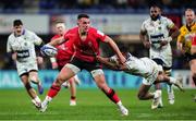 11 December 2021; James Hume of Ulster is tackled by Cheikh Tiberghien of Clermont Auvergne during the Heineken Champions Cup Pool A match between ASM Clermont Auvergne and Ulster at Stade Marcel-Michelin in Clermont-Ferrand, France. Photo by Julien Poupart/Sportsfile