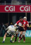 11 December 2021; Sean Reidy of Ulster is tackled by Yohan Beheregaray of Clermont Auvergne during the Heineken Champions Cup Pool A match between ASM Clermont Auvergne and Ulster at Stade Marcel-Michelin in Clermont-Ferrand, France. Photo by Julien Poupart/Sportsfile