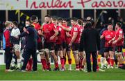 11 December 2021; The Ulster players and staff celebrate after the Heineken Champions Cup Pool A match between ASM Clermont Auvergne and Ulster at Stade Marcel-Michelin in Clermont-Ferrand, France. Photo by Julien Poupart/Sportsfile